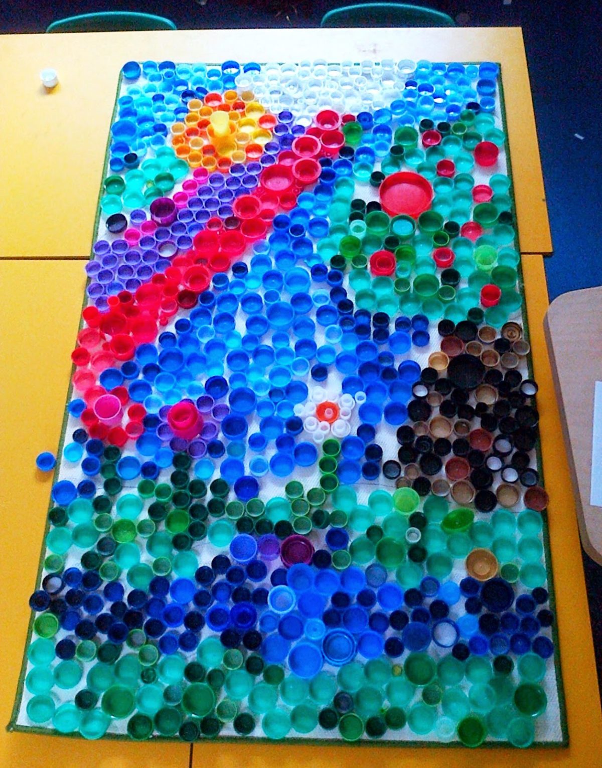 11 + DIY Ideas to Design a Bottle Cap Mosaic | ArtisticJunkie.com